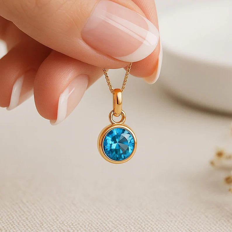 SIM-Aquamarine (Light Blue) Birthstone Pendant with gold plated chain included