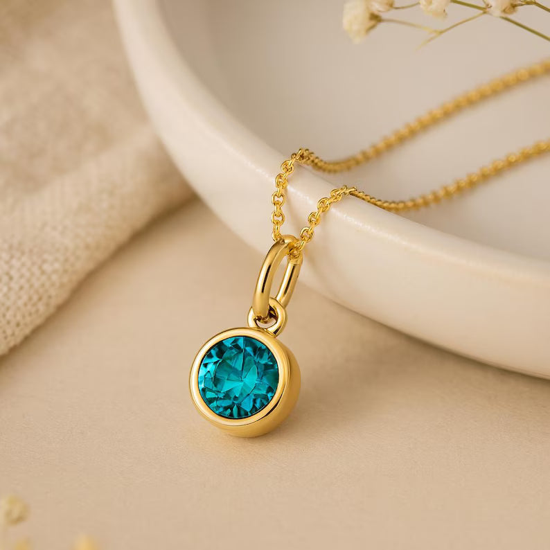 SIM-Aquamarine (Light Blue) Birthstone Pendant with gold plated chain included